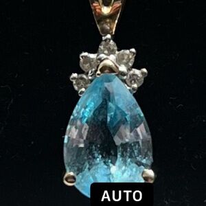 Elegant Blue Topaz Teardrop Pendant 14k